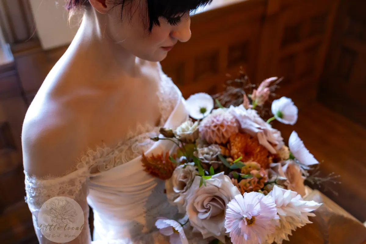 Allison bridal portrait holding her bouquet